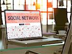 Social Network Concept - Closeup on Landing Page of Laptop Screen in Modern Office Workplace. Toned Image with Selective Focus. 3D Render.