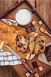 Delicious fresh homemade banana bread (loaf cake) with chocolate for breakfast, top view