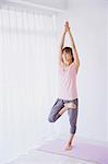 Young Japanese woman practicing yoga