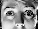 1940s 1950s CLOSE-UP WOMAN EYES SHOWING FEAR