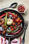Fried vegetables with chilli peppers, garlic and vine tomatoes