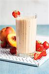 A nectarine, banana and strawberry smoothie