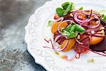 Blood orange salad with red onions and pine nuts