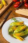 An arrangement of courgette flowers