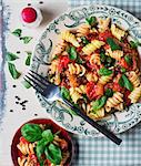 Fusilli pasta with tomatoes and basil