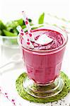 A beetroot, apple and spinach smoothie in a glass