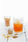 A jar of marmalade, ground ginger and candied ginger