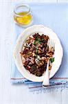 Herring salad with pumpernickel, walnuts, honey and parsley