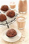 Chocolate nut truffles and glasses of cocoa