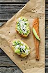 Baguettes with avocado, feta cheese, black sesame seeds and fleur de sel