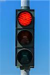 Red Traffic Light Against Blue Sky, Denmark