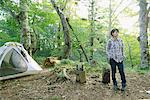 Young Japanese woman at a camp site