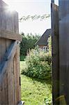 Open door with house in background