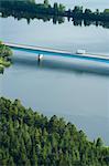 Aerial view of semi-truck on bridge