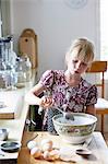 Girl cooking in kitchen