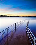 Lake and abandoned pier