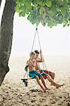 Boys on swing