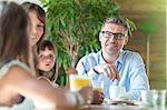 Family talking at table