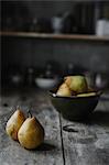 Fresh pears on a kitchen table.