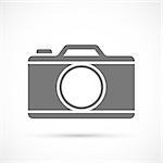 Photo camera icon on white background. Vector illustration.