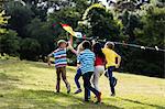 Children playing with a kite