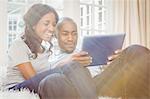 Young couple using a laptop