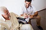 Nurse giving an injection to a senior man