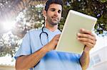 Nurse reading his notebook