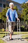 Senior woman posing with her Zimmer Frame