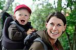 Mothera with son in baby carrier