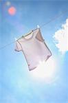 Laundry hanging against blue sky