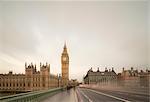 Blurred traffic crossing Westminster Bridge to Palace of Westminster, London, UK