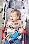 Toddler sleeping in stroller