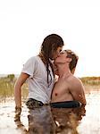 USA, Utah, Provo, couple kissing in lake