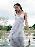 USA, Utah, Provo, woman wading in lake