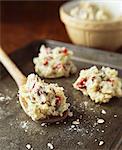 Scoops of cookie dough on baking tray