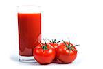 Tasty tomato juice and tomatoes over white.