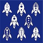 White vector rocket icons collection on blue background