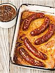 close up of rustic english pub grub toad in the hole