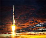 Carrier Rocket On A Background Of Red Clouds. 3D Scene.