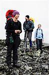 Tourists on rocky terrain