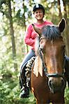 Mature woman on horse