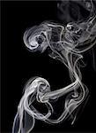 Smoke against black background.