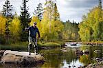 A man fly-fishing, Sweden.