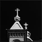 Ornate crosses on church towers