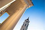 Pillars and tower against blue sky