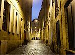 Cobbled street at night, Bordeaux, France