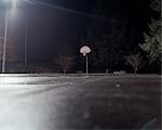 Empty basketball court at night