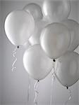 Studio shot of a bunch of white balloons