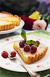 Cake with raspberries on plate